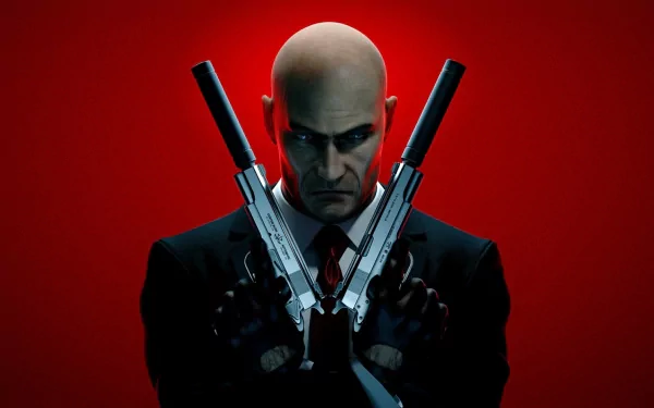 HD desktop wallpaper featuring a character from the video game Hitman: Absolution, showcasing a bald man in a suit holding two guns against a dramatic red background.