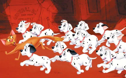 HD desktop wallpaper featuring animated puppies and a cat from the movie 101 Dalmatians in a lively chase scene on a vibrant red background.
