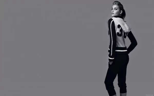 HD PC desktop wallpaper featuring a confident woman, Ana Beatriz Barros, dressed in a stylish black and white outfit against a plain gray background.