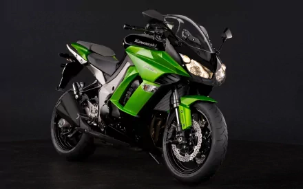 Green Kawasaki Z1000SX sport-touring motorcycle on a black backdrop — 2K Quad HD PC desktop wallpaper/background.