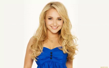 HD PC desktop wallpaper featuring celebrity Hayden Panettiere smiling in a blue dress against a plain light background.