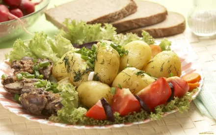 HD PC desktop wallpaper featuring a meal with boiled potatoes garnished with herbs, fresh salad, tomato slices, and slices of bread on a plate.