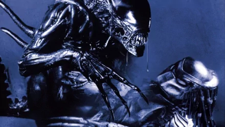 HD Sci-Fi PC wallpaper featuring the alien creature from Alien vs. Predator, showcasing its menacing form against a dark blue background.