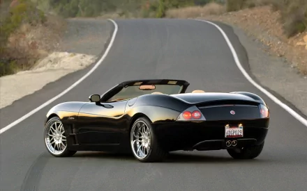 Black Anteros Corvette convertible (Chevrolet Corvette) on a winding road, HD PC desktop wallpaper/background.
