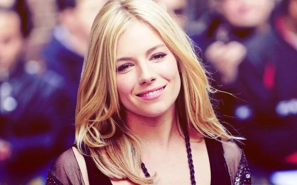 HD PC desktop wallpaper featuring a close-up of celebrity Sienna Miller smiling with blurred crowd in the background.