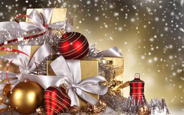 HD desktop wallpaper and background image featuring gold-wrapped gifts with white bows, red and gold Christmas ornaments, tinsel, and a sparkling holiday backdrop.
