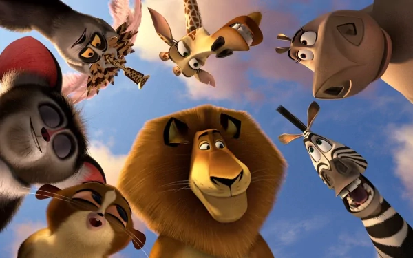 HD PC desktop wallpaper featuring main characters from the movie Madagascar 3: Europe’s Most Wanted looking down against a blue sky background.