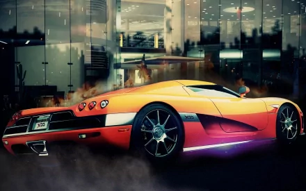 HD PC desktop wallpaper featuring an orange Koenigsegg sports car parked in front of a modern glass building at dusk.