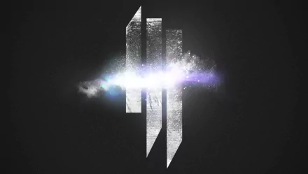 HD desktop wallpaper featuring the Skrillex logo with a bright, cosmic energy burst in the background. The design exudes a dynamic and electrifying musical vibe.
