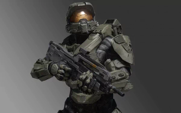 A high-definition desktop wallpaper featuring Master Chief from Halo 4, showcasing the iconic armored character holding a weapon against a striking background.