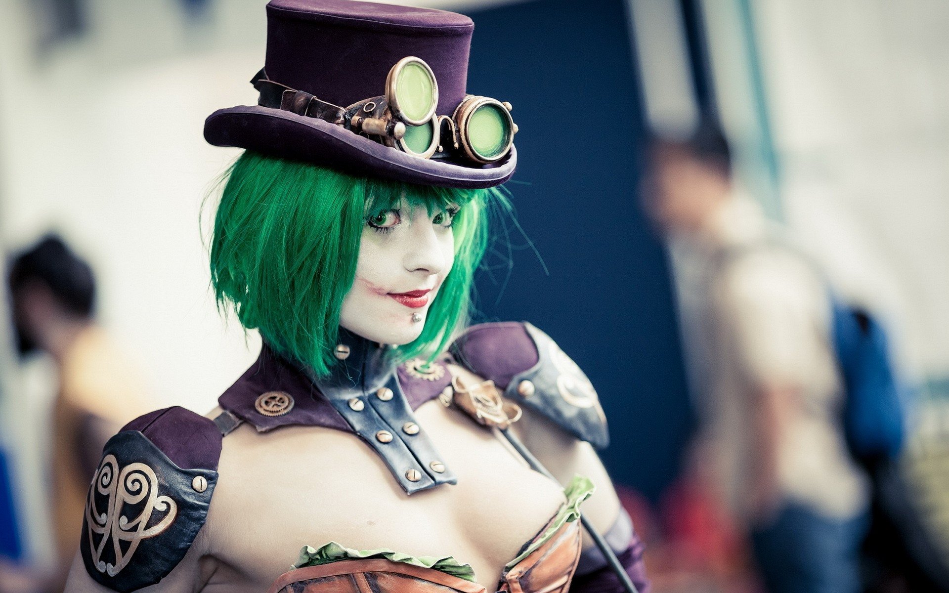 HD PC desktop wallpaper featuring a woman in detailed cosplay with green hair, steampunk goggles, and armor-inspired costume elements.