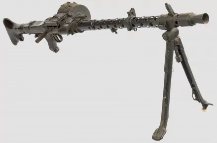 A detailed image of a machine gun set against a minimalist background, showcasing its man-made design. This high-definition wallpaper highlights the weapon's intricate features.
