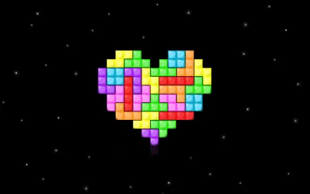 Colorful pixel art heart made of Tetris blocks floats against a starry black background in this HD PC desktop wallpaper inspired by classic video games.
