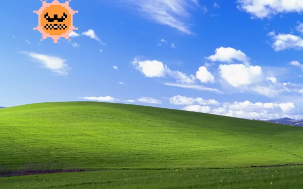 HD PC desktop wallpaper featuring a bright green landscape under a blue sky with clouds, overlaid with a pixelated angry sun from the Super Mario Bros. 3 video game.
