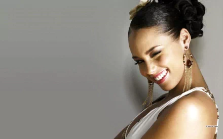 HD PC desktop wallpaper featuring a smiling Alicia Keys against a neutral gray background, highlighting her music and elegance.