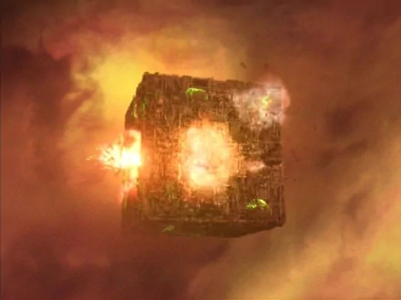 HD PC desktop wallpaper featuring a Borg cube from Star Trek, capturing the sci-fi icon in a fiery space battle scene.