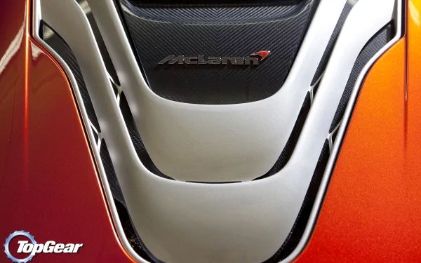 HD PC desktop wallpaper/background of a McLaren vehicle: close-up of the glossy orange rear engine cover showcasing the McLaren logo and TopGear badge.