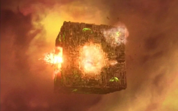 HD PC desktop wallpaper featuring a Borg cube from Star Trek, capturing the sci-fi icon in a fiery space battle scene.