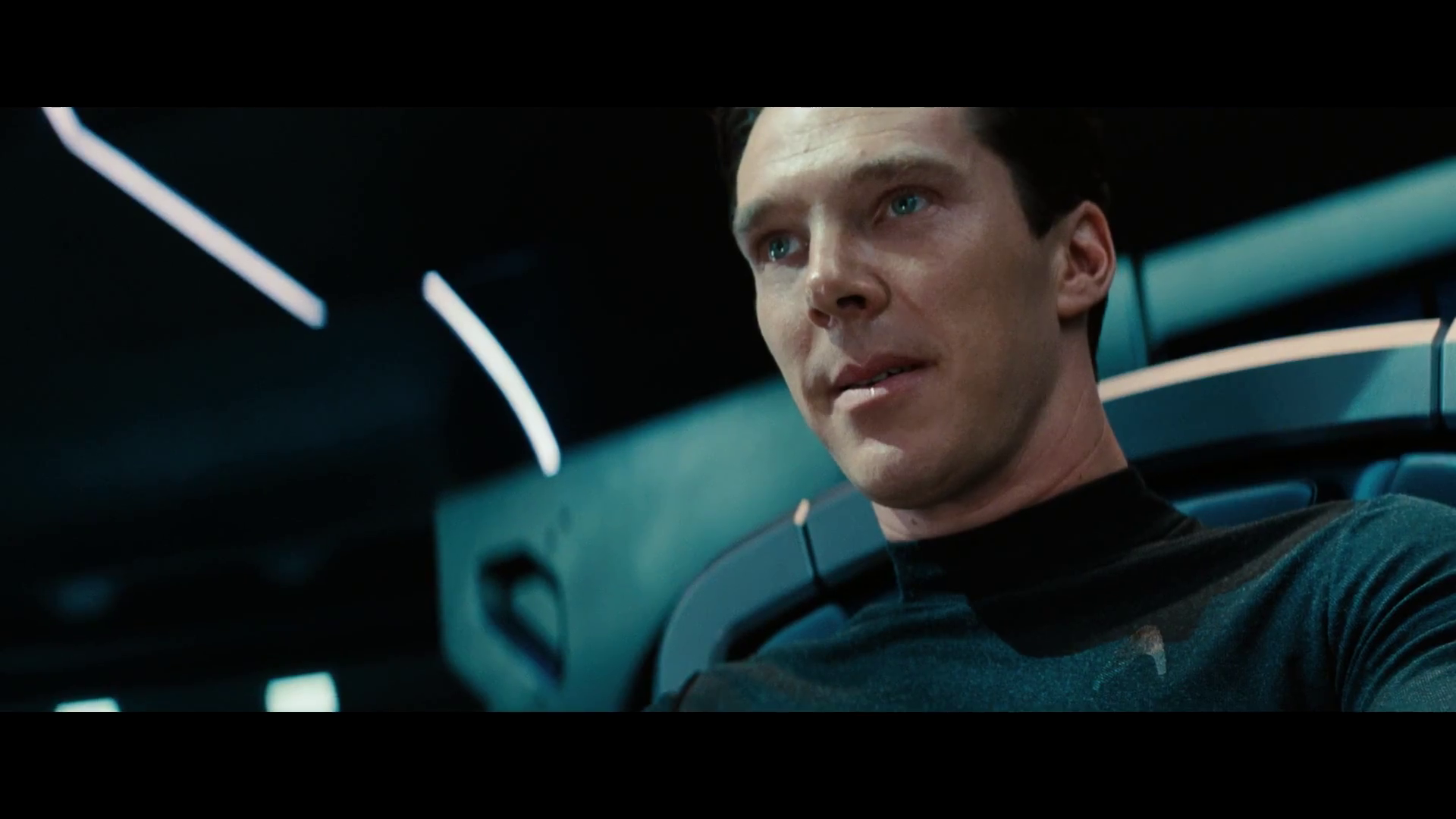 HD wallpaper from Star Trek Into Darkness featuring a character inside a starship with futuristic interior design.