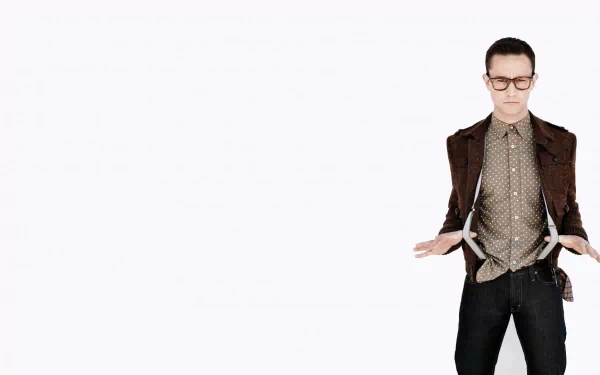 Joseph Gordon-Levitt in a stylish outfit on a white background, as a high-definition desktop wallpaper.