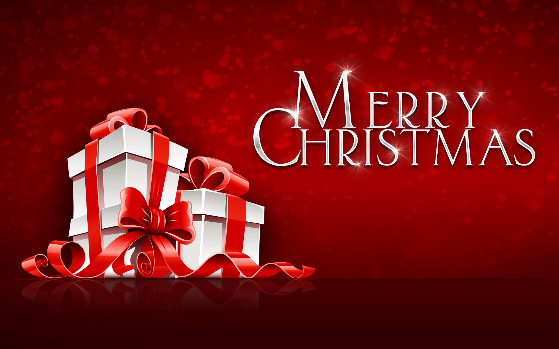 HD PC desktop wallpaper featuring a festive red background with wrapped Christmas gifts and the text Merry Christmas for the holiday season.