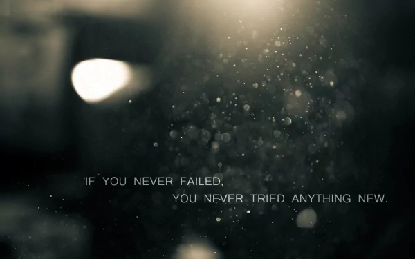 HD motivational desktop wallpaper featuring the inspirational quote If you never failed, you never tried anything new on a bokeh light background.