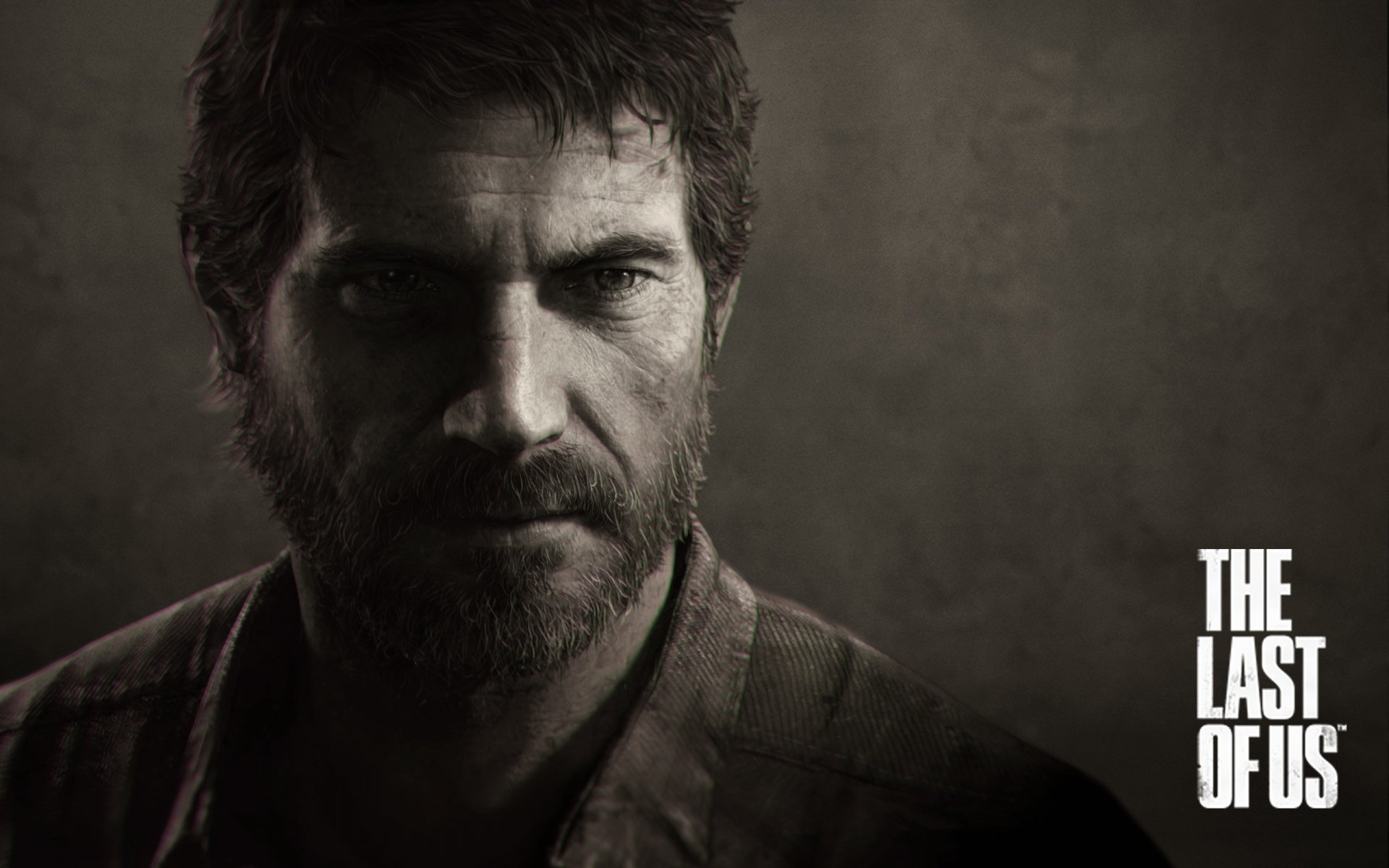 HD desktop wallpaper featuring a close-up of a bearded man from The Last Of Us with the game's logo on the right.