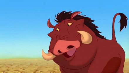 HD wallpaper of Pumbaa from The Lion King against a blue sky and savannah background.