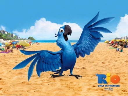 HD desktop wallpaper of the animated character Blu from Rio on a beach, with text Rio - Only in Theaters.