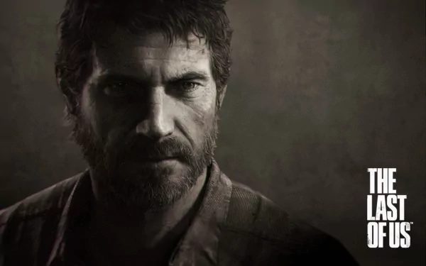 HD desktop wallpaper featuring a close-up of a bearded man from The Last Of Us with the game's logo on the right.
