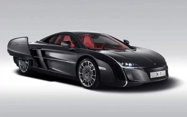 Black McLaren concept car with sleek futuristic design and red interior, showcased as an HD PC desktop wallpaper and background.