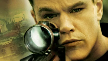 HD desktop wallpaper featuring a focused close-up from The Bourne Supremacy with a character peering through a sniper scope.