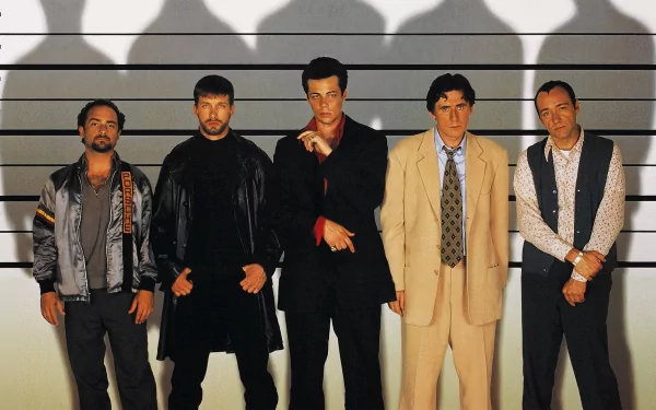 HD desktop wallpaper of The Usual Suspects film cast including Gabriel Byrne and Kevin Spacey, with strong shadow lines in the background.