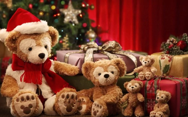 A festive HD desktop wallpaper featuring teddy bears in a holiday setting. One bear wears a Santa hat, surrounded by gifts against a Christmas backdrop with a decorated tree.