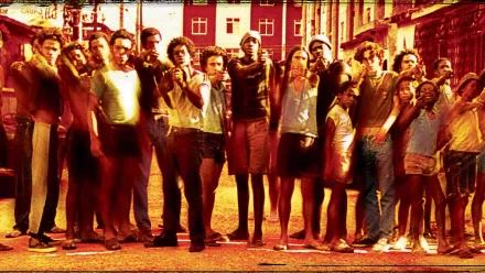 HD wallpaper depicting a group of people from the film City of God, standing together with a vibrant urban backdrop.