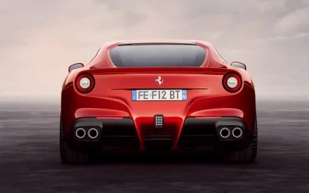 Red Ferrari F12berlinetta, rear view, showcased as a high-definition desktop wallpaper and background.