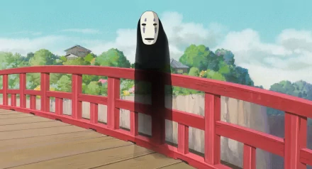 A high-definition desktop wallpaper featuring No-Face from Spirited Away, standing quietly on a red bridge with lush greenery in the background.