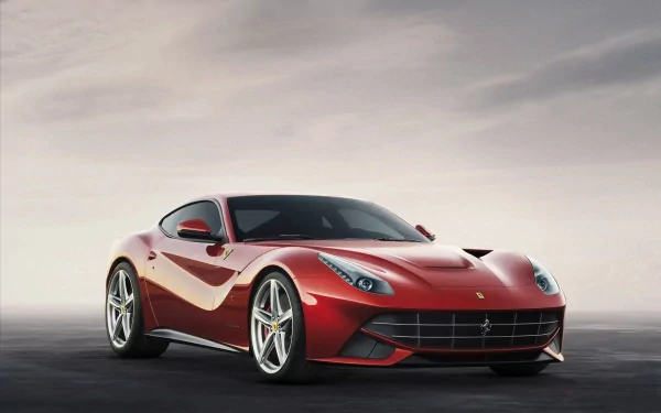 A stunning HD desktop wallpaper featuring a sleek Ferrari F12berlinetta, showcasing its sporty design against a minimalist background.