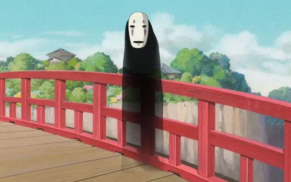 A high-definition desktop wallpaper featuring No-Face from Spirited Away, standing quietly on a red bridge with lush greenery in the background.