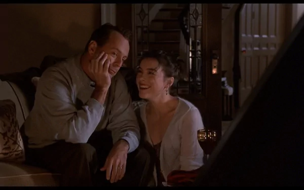 HD desktop wallpaper featuring Bruce Willis and a woman in a scene from the movie The Sixth Sense, capturing an intimate and emotional moment.