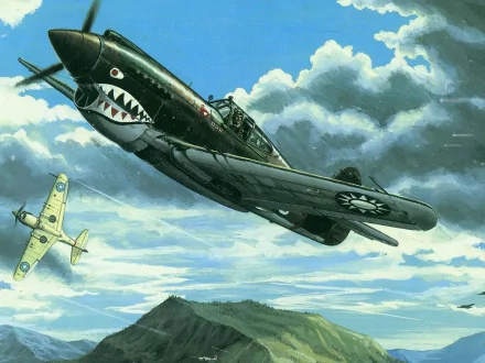 HD PC desktop wallpaper background: a military aircraft with shark-mouth nose art banking over mountains beneath dramatic clouds.
