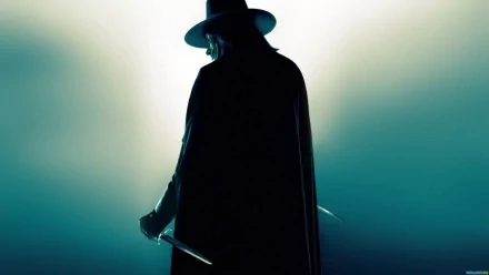 A striking HD wallpaper featuring a mysterious figure in a dark cloak and hat from the movie V for Vendetta, poised with a knife against a dramatic background.