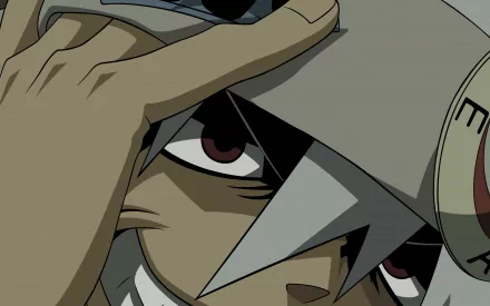 A dynamic close-up of a character from the anime Soul Eater, showcasing intense eyes and distinctive features, designed as an HD desktop wallpaper and background.