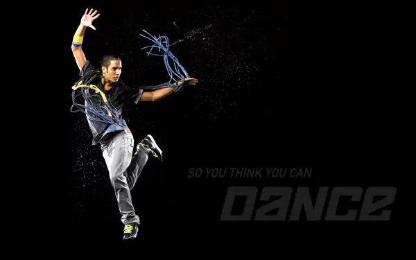 HD desktop wallpaper featuring a dancer mid-jump with dynamic light effects, inspired by the TV show So You Think You Can Dance.