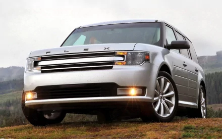 Ford Flex vehicle pictured on a grassy hill with overcast sky — HD PC desktop wallpaper and background.