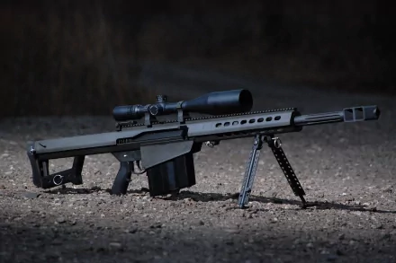 HD desktop wallpaper featuring a sniper rifle with a sleek design, mounted on a bipod, set against a dark, natural background.