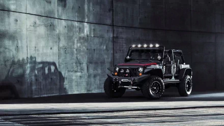 HD wallpaper featuring a rugged Jeep next to a concrete wall, casting a distinct shadow. The dark-toned background contrasts with the vehicle, creating a striking visual for desktop screens.