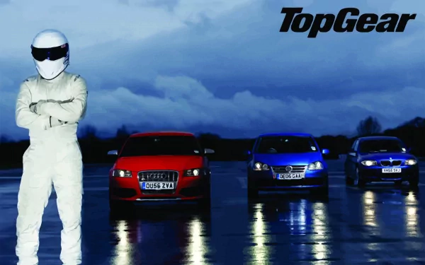 HD wallpaper featuring The Stig from Top Gear standing before three cars on a track, under moody skies with the show's logo.