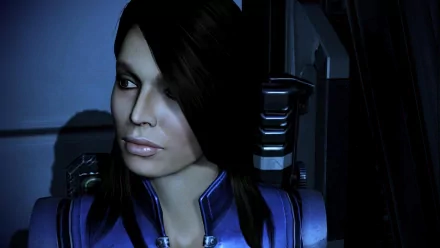 HD PC desktop wallpaper/background: close-up of Ashley Williams from the video game Mass Effect 3, in blue armor with a serious expression against a dark sci‑fi interior.
