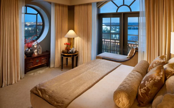 Man-made elegant bedroom with large windows, beige curtains, a comfortable bed, and scenic outdoor views, captured as an HD PC desktop wallpaper and background.